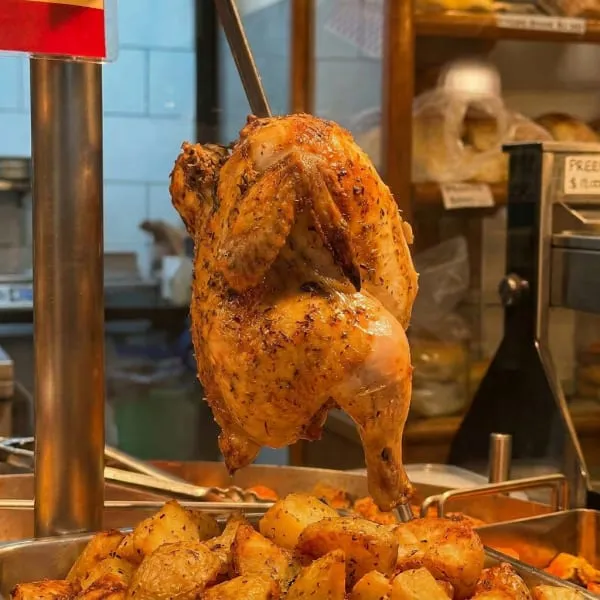1/2 Pollo rostizado C/Papas